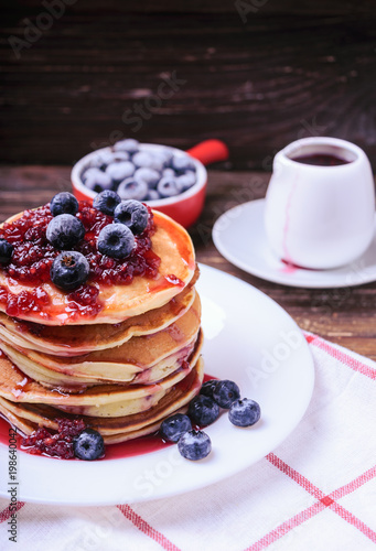 American pancakes with jam and blueberries