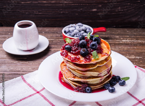 American pancakes with jam and blueberries