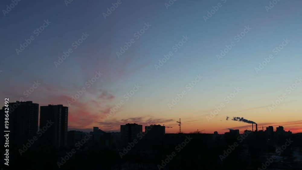 Townscape on sunset background, time-lapse Townscape on sunset background, time-lapse