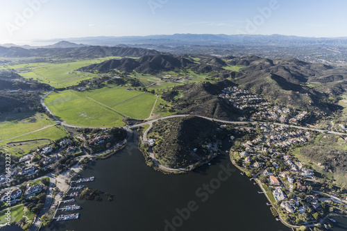 Aerial view of Lake Sherwood, Hidden Valley and the Santa Monica Mountains near Malibu, Westlake Village and Thousand Oaks California. photo