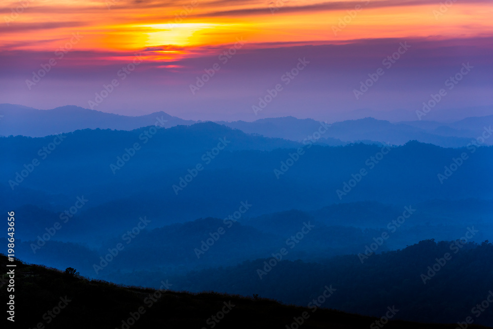 layer mountains in the evening in the tropical rainforest of Thailand