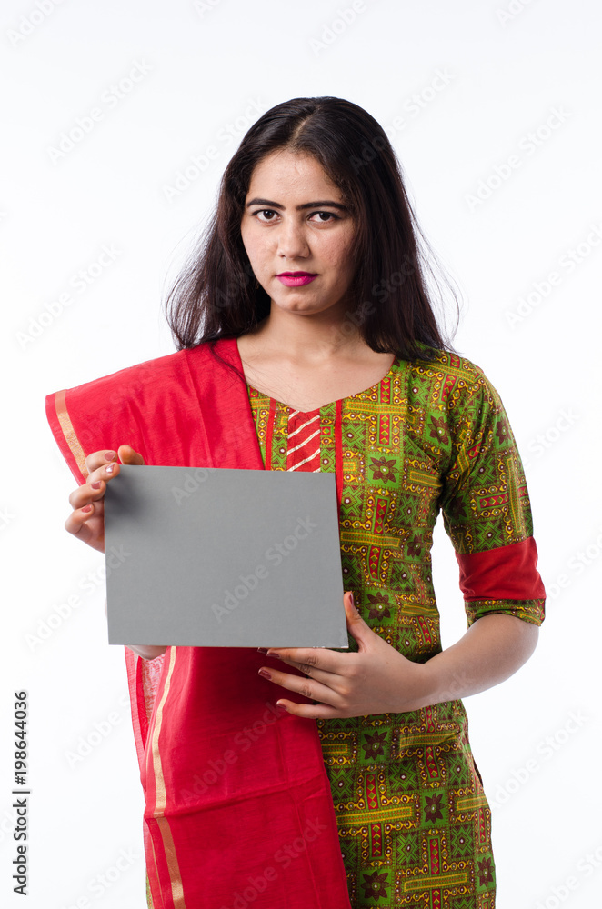 Young girl from India with a message board Young girl from India with a message board