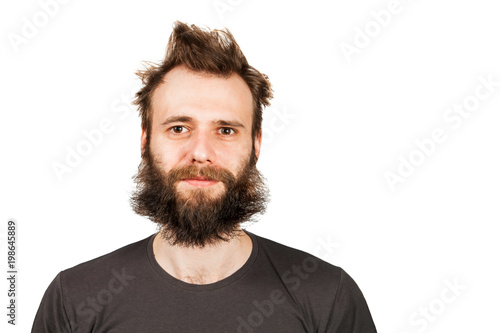 Portrait of young bearded man. Isolated on white. photo