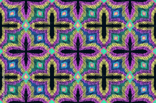 Ethnic pattern. Aztec fabric. Embroidery effect. Tribal ornament. Embroidery effect. Clothes or interior design. Boho fashion. Traditional homespun textile. Vector seamless pattern