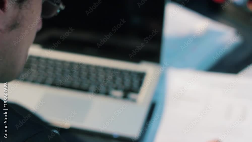 Businessman in the office working with documents Businessman in the office working with documents