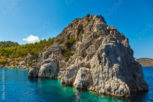 Rock in the Aegean Sea. Rocky island. Rocky coast. Snake island. Turkey
