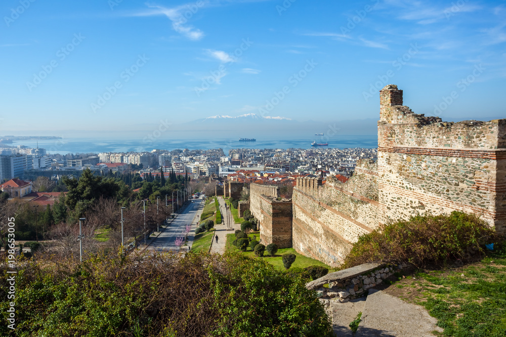 10.03.2018 Thessaloniki, Greece - Panoramic View of Thessaloniki and its Byzantine Wall Ruins, along with Thermaikos Gulf and Mount Olympus in the Background