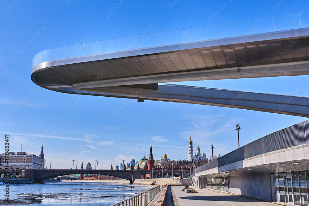Floating  pedestrian Bridge Zaryadye park, in front of the Moscow Kremlin, Russia