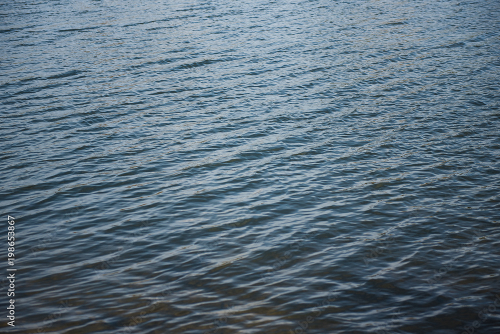 Fast river water background with waves and ripple pattern Fast river water background with waves and ripple pattern