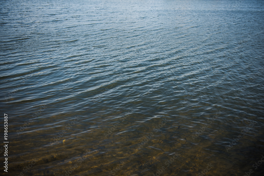 Fast river water background with waves and ripple pattern Fast river water background with waves and ripple pattern