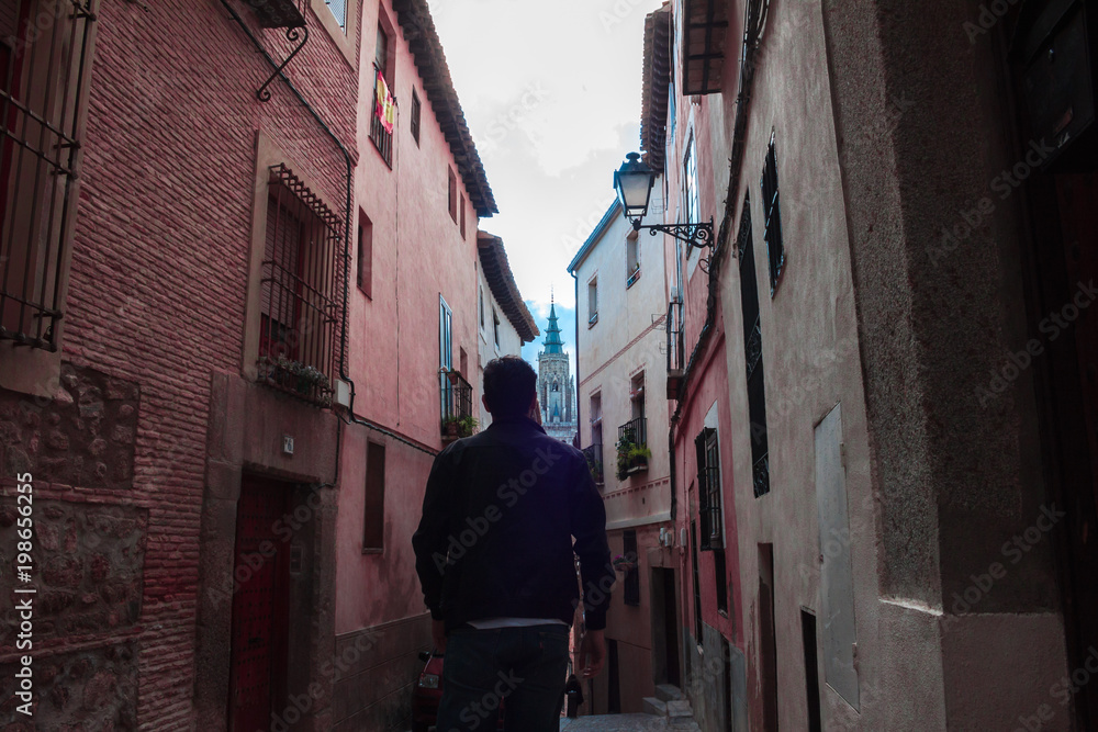 Bearded man in old streets