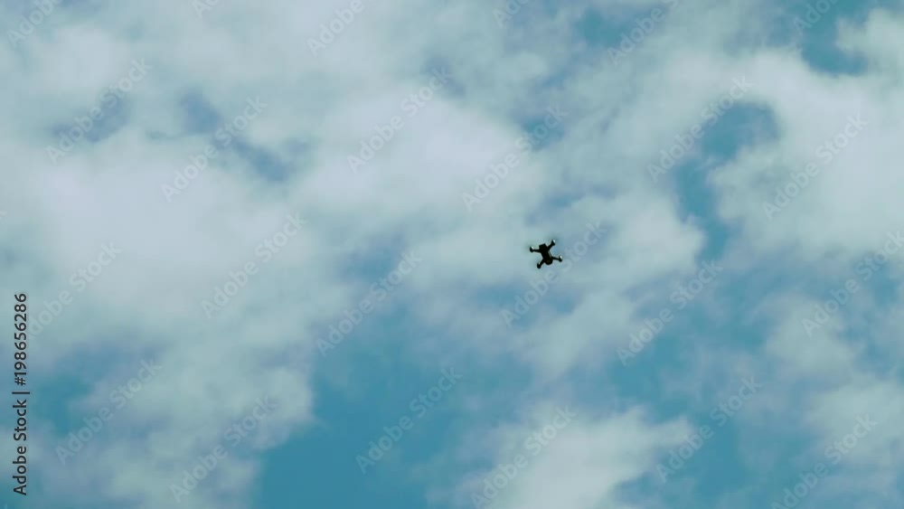 View copter in sky with different shaped clouds View copter in sky with different shaped clouds