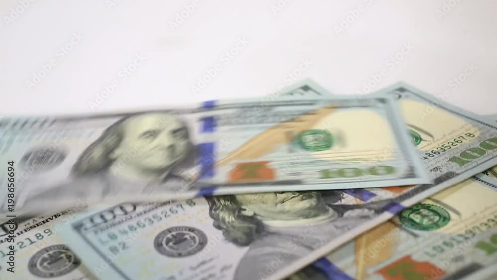 Caucasian hands counting dollar banknotes Caucasian hands counting dollar banknotes
