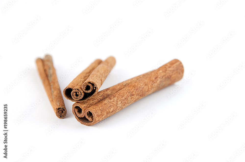 Pieces of cinnamon isolated on a white background. Pieces of cinnamon isolated on a white background.