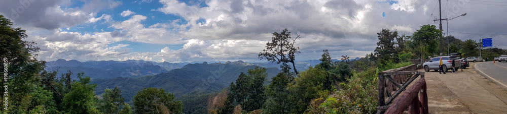 panoramic landscape of jungle and row and layer of mountain background