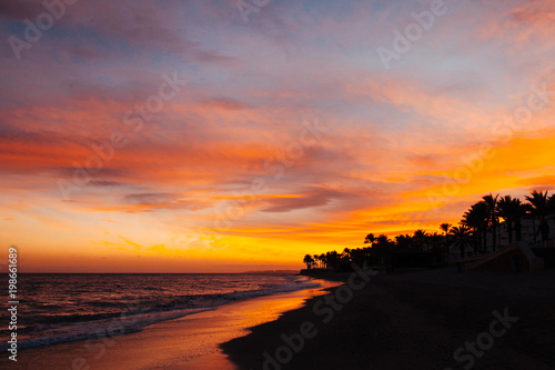 amazing sunset on a nice beach © ManuPadilla