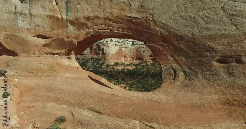Through Arch High to low beautiful reveal - Drone Aerial video 4K Arches National Park, Moab Utah, corona arch, Delicate arch, North Window, Turret arch, Landscape arch, Through Arch High to low beautiful reveal - Drone Aerial video 4K Arches National Park, Moab Utah, corona arch, Delicate arch, North Window, Turret arch, Landscape arch,