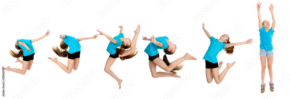 The girl gymnast performs a jump. The girl gymnast performs a jump.