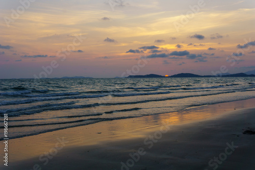 Fototapeta Naklejka Na Ścianę i Meble -  panorama landscape view of seascape and skyline with sun over the sea between the island and amazing twilight in the evening.