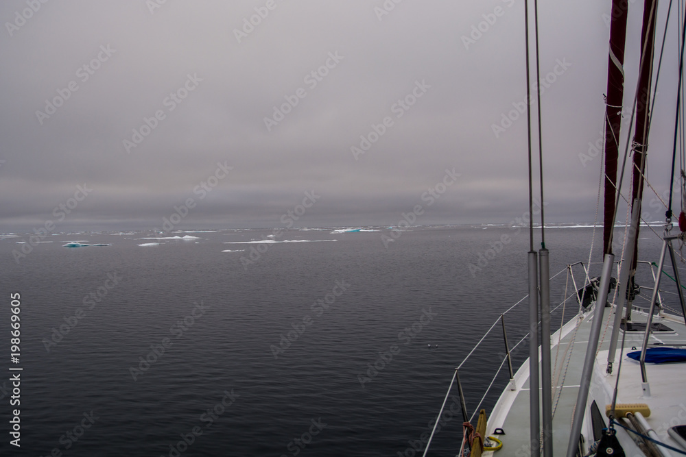 Sailing to Nunavut (Canada). Ice and grey view Sailing to Nunavut (Canada). Ice and grey view