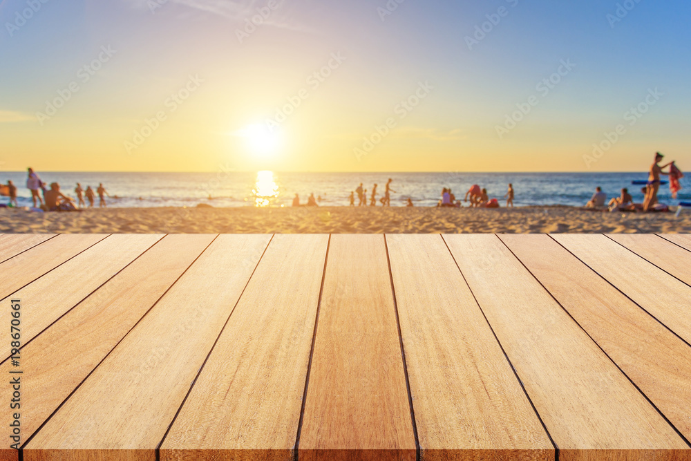 Wooden board or table and abstract blurred background. Free space can be used for photo montage or product display design and advertising Wooden board or table and abstract blurred background. Free space can be used for photo montage or product display design and advertising