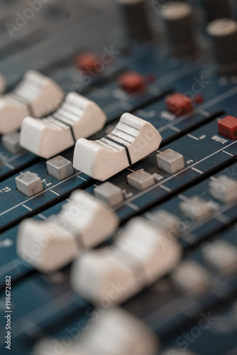 Close up of music mixer equalizer console for mixer control sound device.
