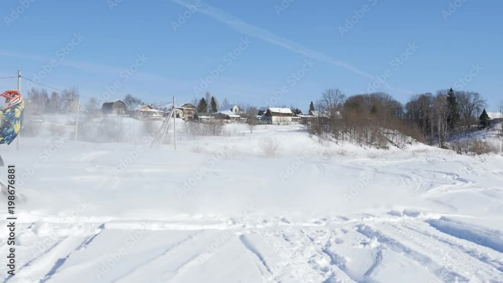 Man on snowmobile in winter mountain Man on snowmobile in winter mountain