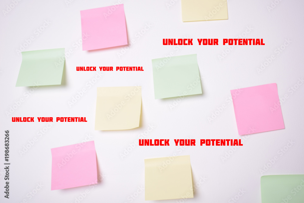 Stickers on the wall with the inscriptions:UNLOCK YOUR POTENTIAL Stickers on the wall with the inscriptions:UNLOCK YOUR POTENTIAL