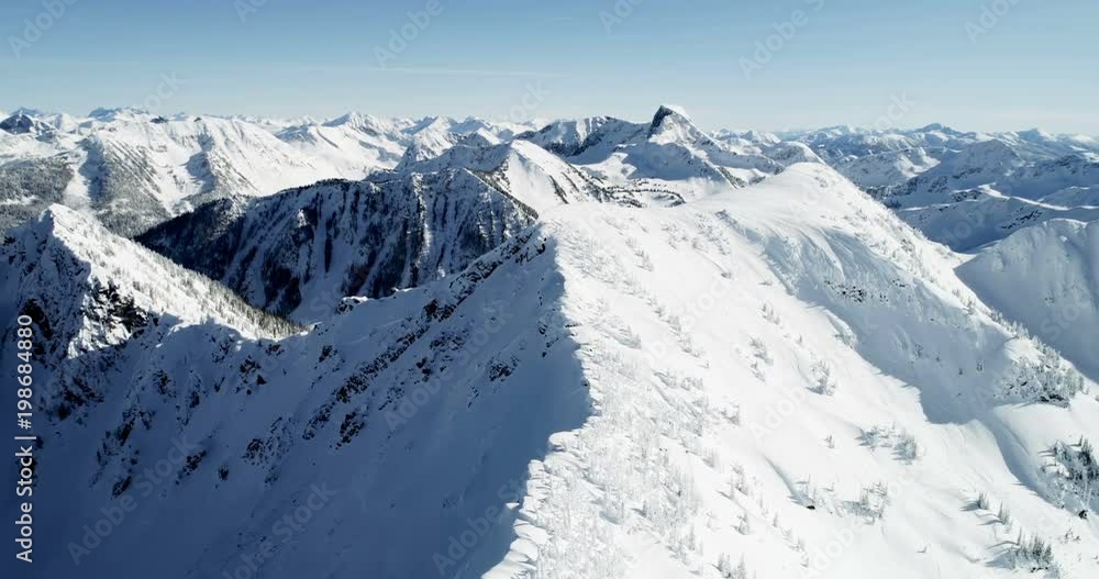 Snow capped mountain during winter Snow capped mountain during winter