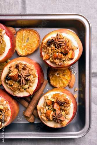 Baked apples with granola, cinnamon, nuts