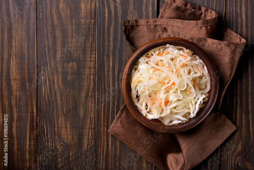 Homemade sauerkraut with carrots photo
