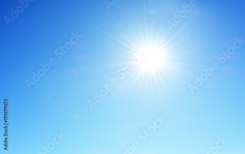 bright white sun on a blue sky.beautiful natural landscape  background