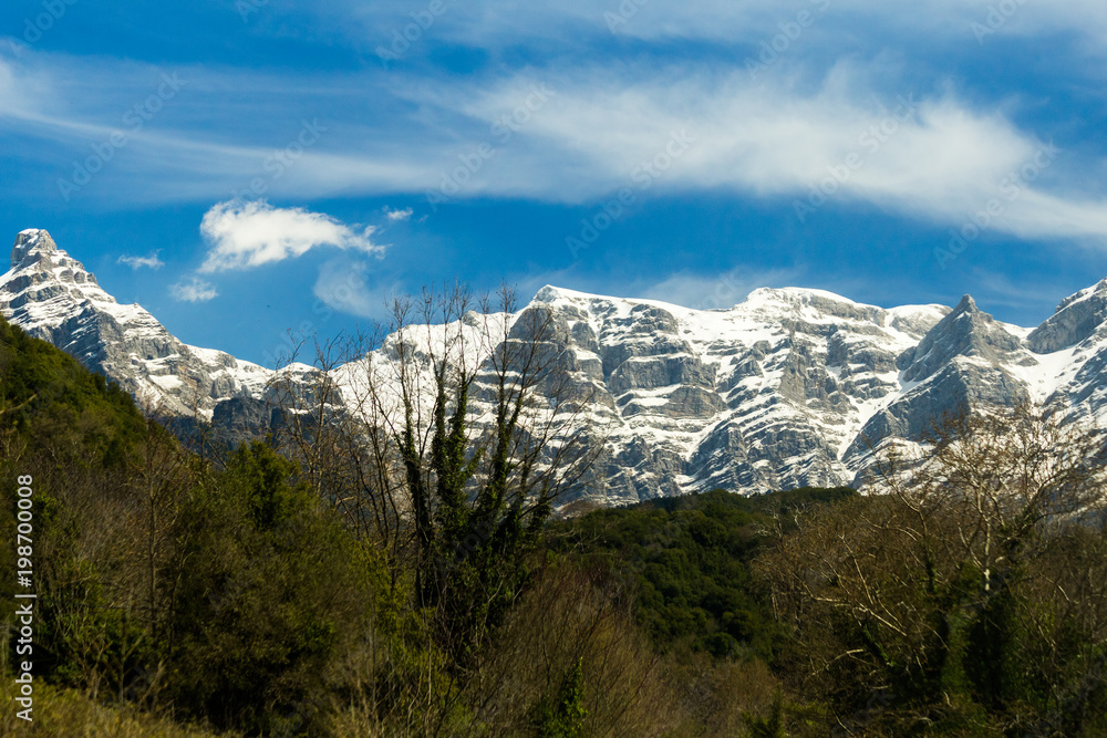 Tzoumerka mountain peaks  in spring time,  snow on the top, epirus greece , for travel background