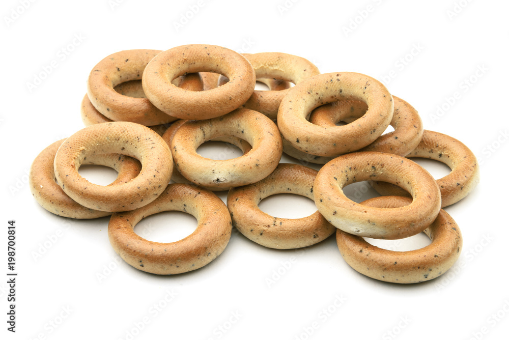 Fresh baked bagels. Bagel breakfast on isolated white background. Diet snack food. Fresh baked bagels. Bagel breakfast on isolated white background. Diet snack food.