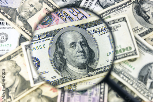 Wallpaper Mural Dollar with magnifier. Magnifying glass and money. Business concept background. Torontodigital.ca