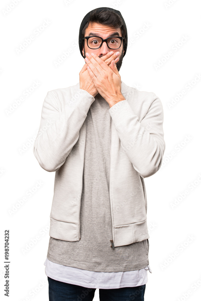 Hipster man covering his mouth on white background Hipster man covering his mouth on white background