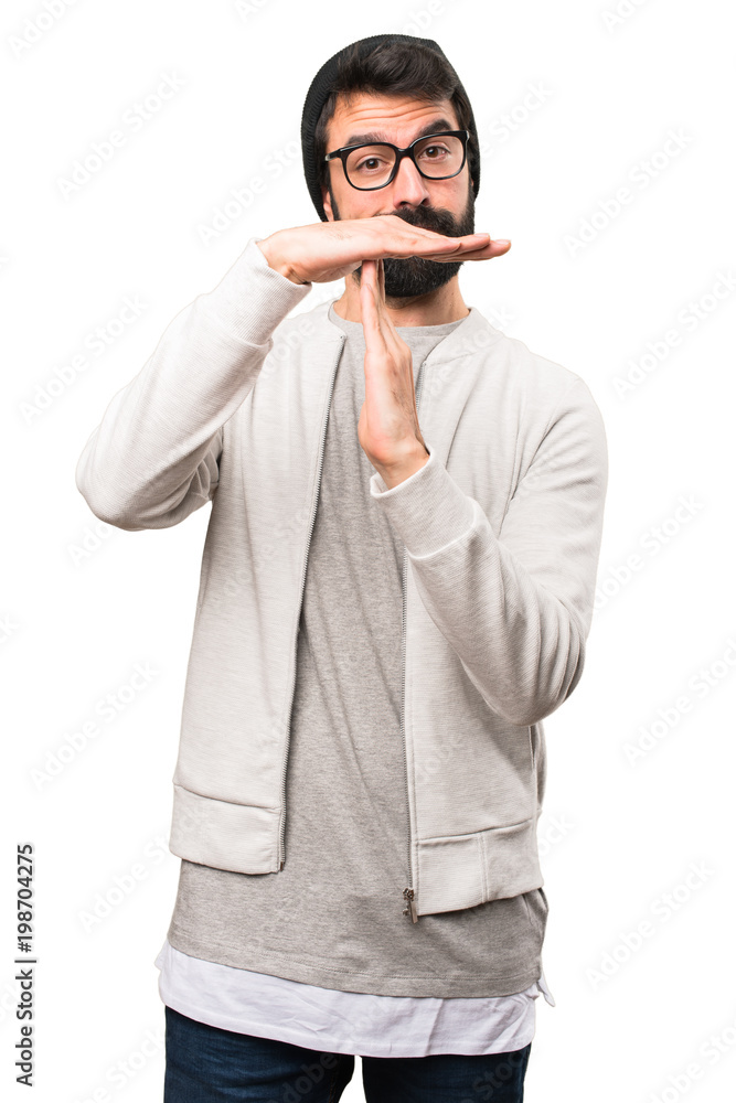 Hipster man making time out gesture on white background Hipster man making time out gesture on white background