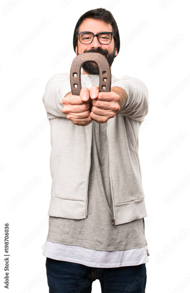 Hipster man with horseshoe on white background Hipster man with horseshoe on white background