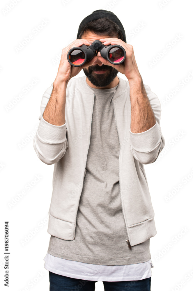 Hipster man with binoculars on white background Hipster man with binoculars on white background