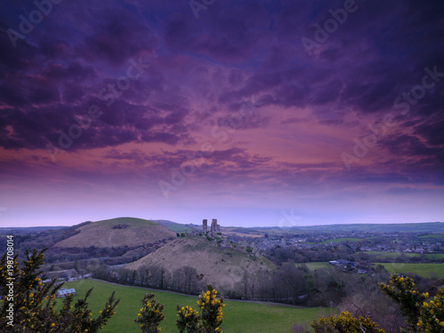 Spring sunset over Corfe Castle, Purbeck, Dorset, UK photo