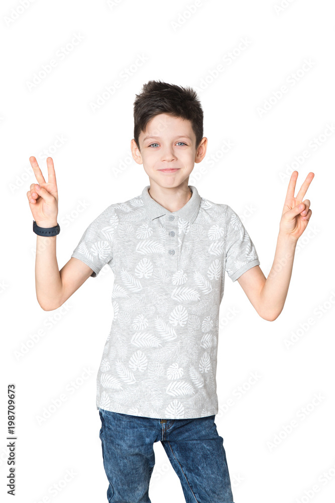 Portrait of a teenager boy showing peace signs with hands on a white background Portrait of a teenager boy showing peace signs with hands on a white background