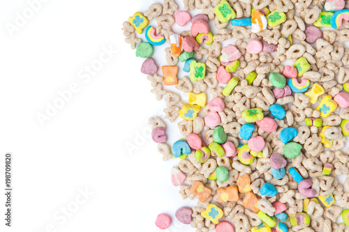 Frosted toasted oat cereal with fun shaped marshmallows on white background.