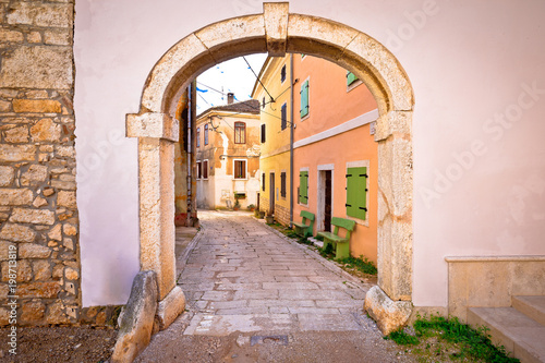 Town of Visnjan old stone gate and street photo