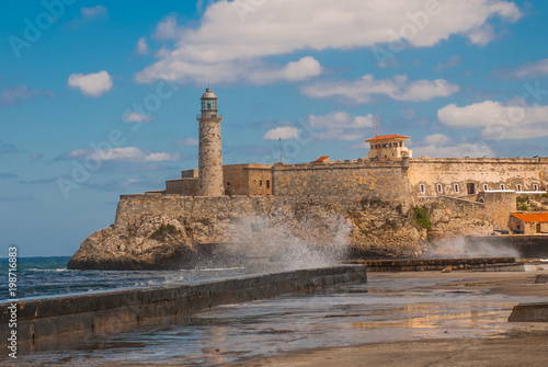 Stormy waves hitting the seawall near to The Castillo Del Morro lighthouse in Havana. The old fortress Cuba