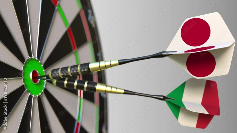 Flags of Japan and Italy on darts hitting bullseye of the target. International cooperation or competition conceptual animation Flags of Japan and Italy on darts hitting bullseye of the target. International cooperation or competition conceptual animation