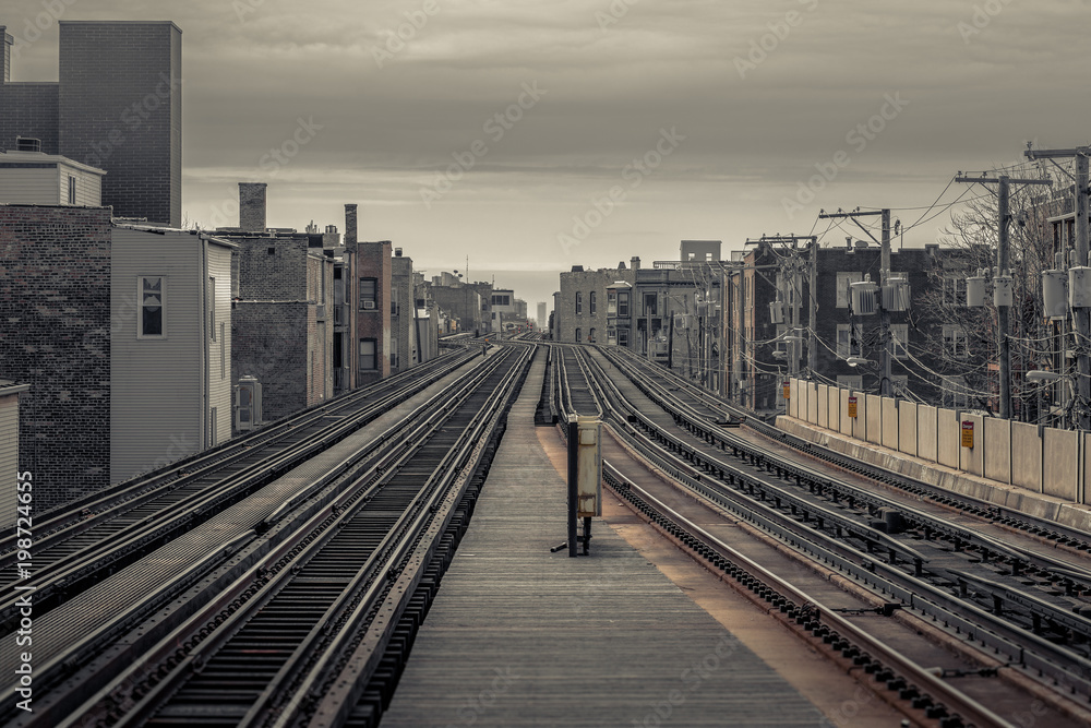 Looking down elevated subway tracks