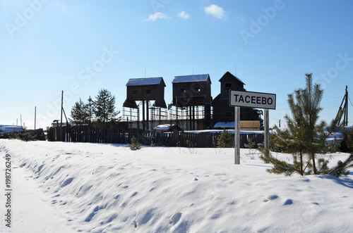 The Siberian village. Houses at height