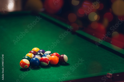 Close up of group of billiard ball is triangle shape.