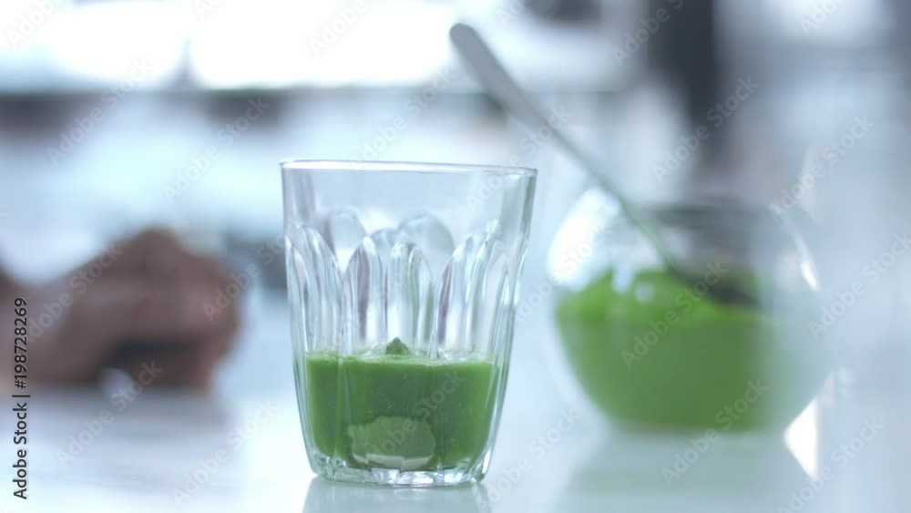 matcha tea preparation in glass with electric blender mixer matcha tea preparation in glass with electric blender mixer