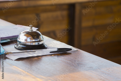 Wallpaper Mural hotel reception bell with pen on counter Torontodigital.ca